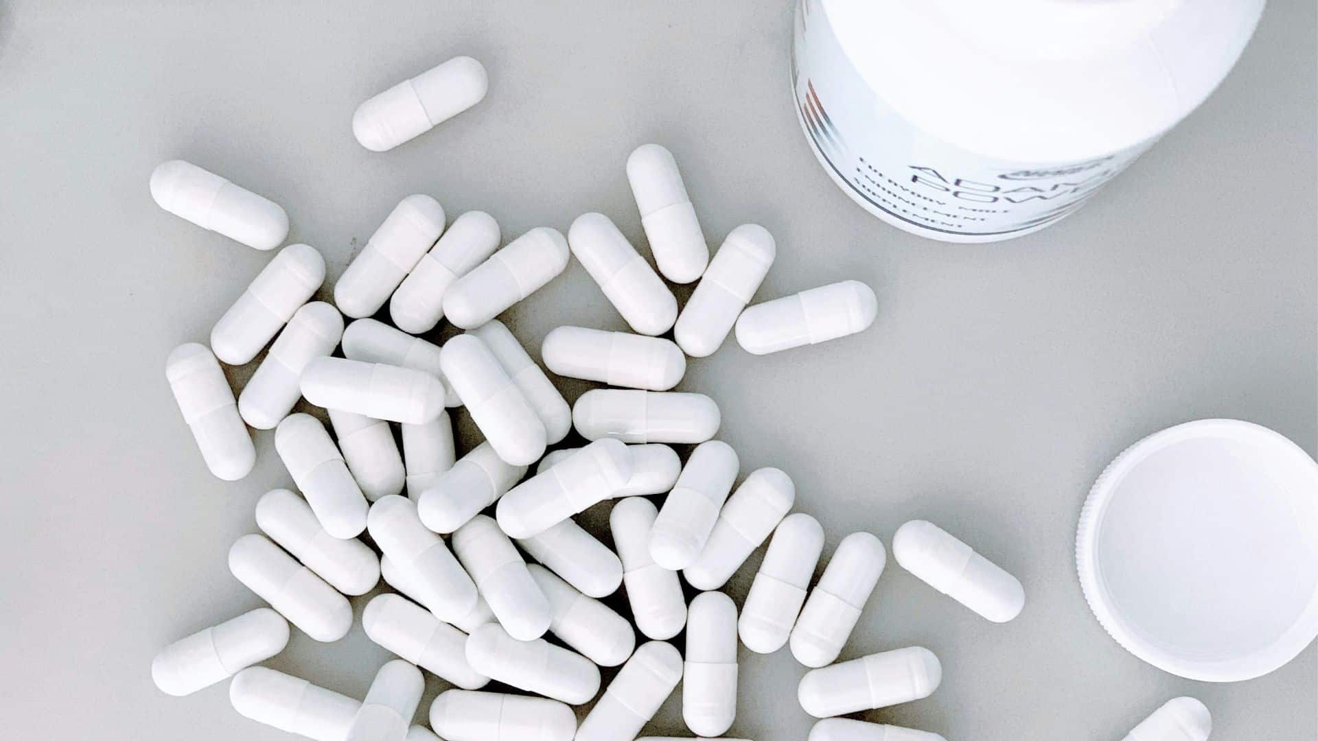 photo of white medication capsules