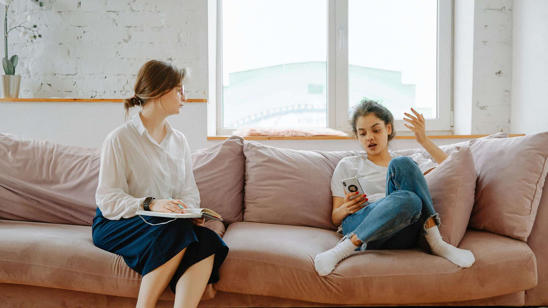 therapist listening to patient