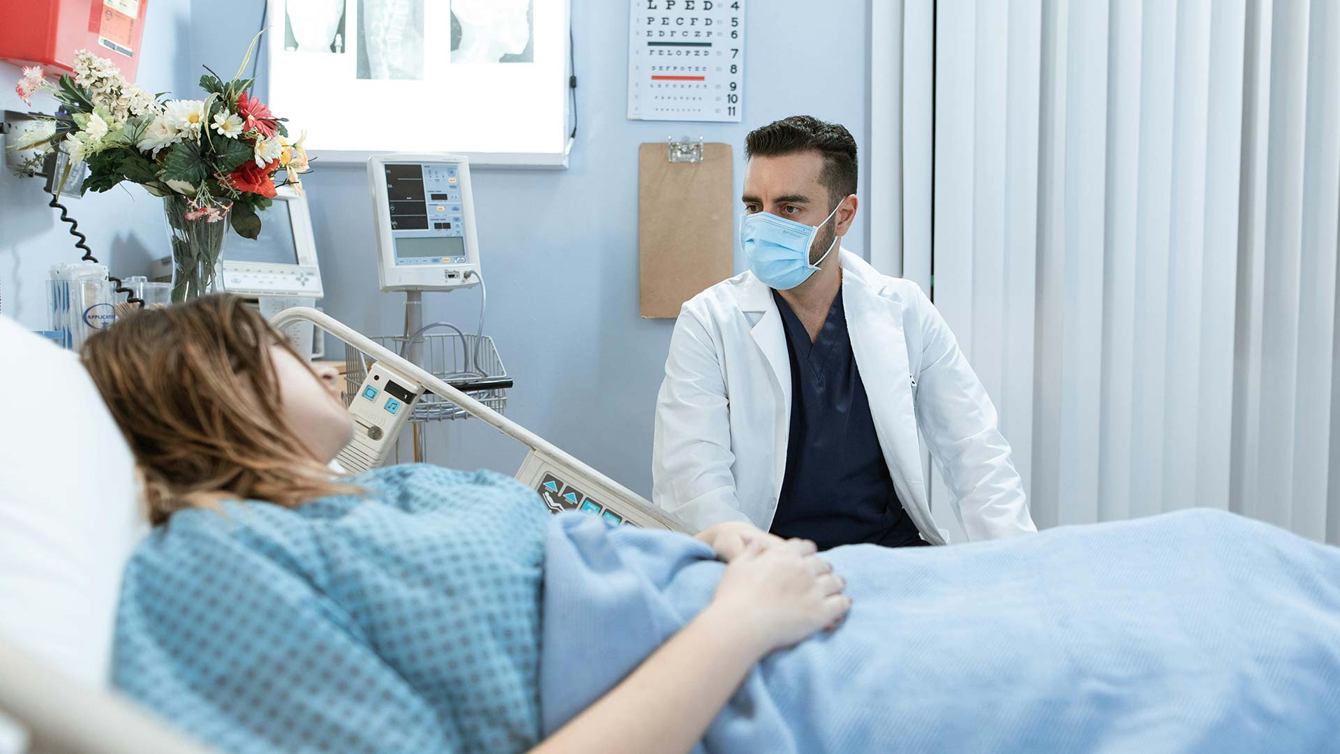 doctor and patient in the hospital room