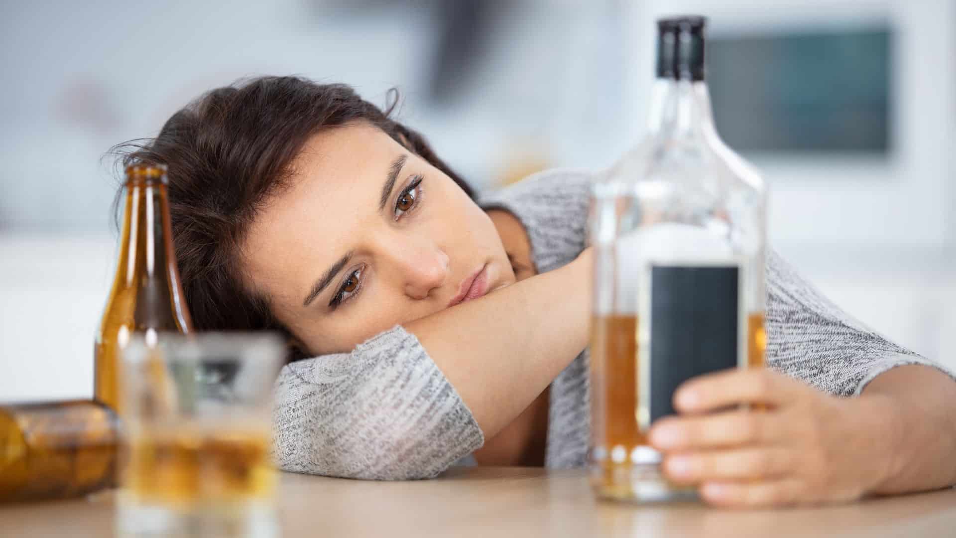 young woman having problem with alcohol