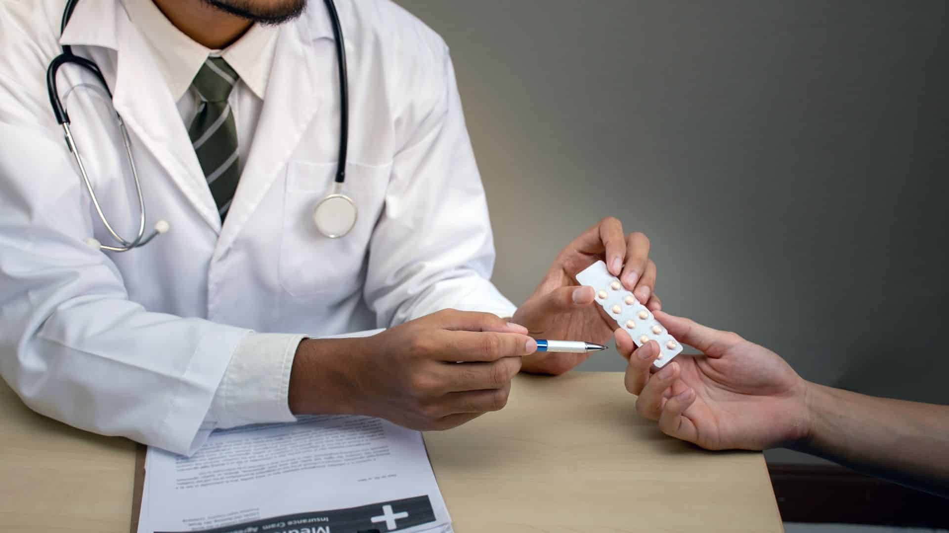 doctor holding pack tablet