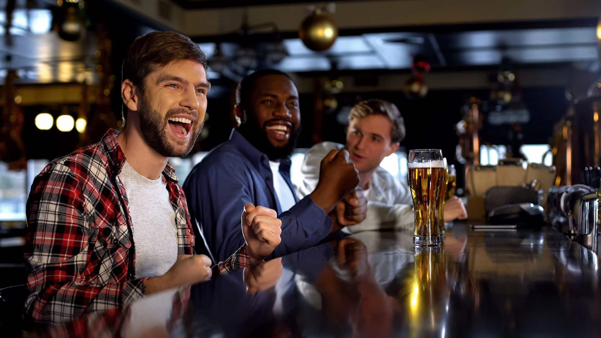 male friends celebrating victory