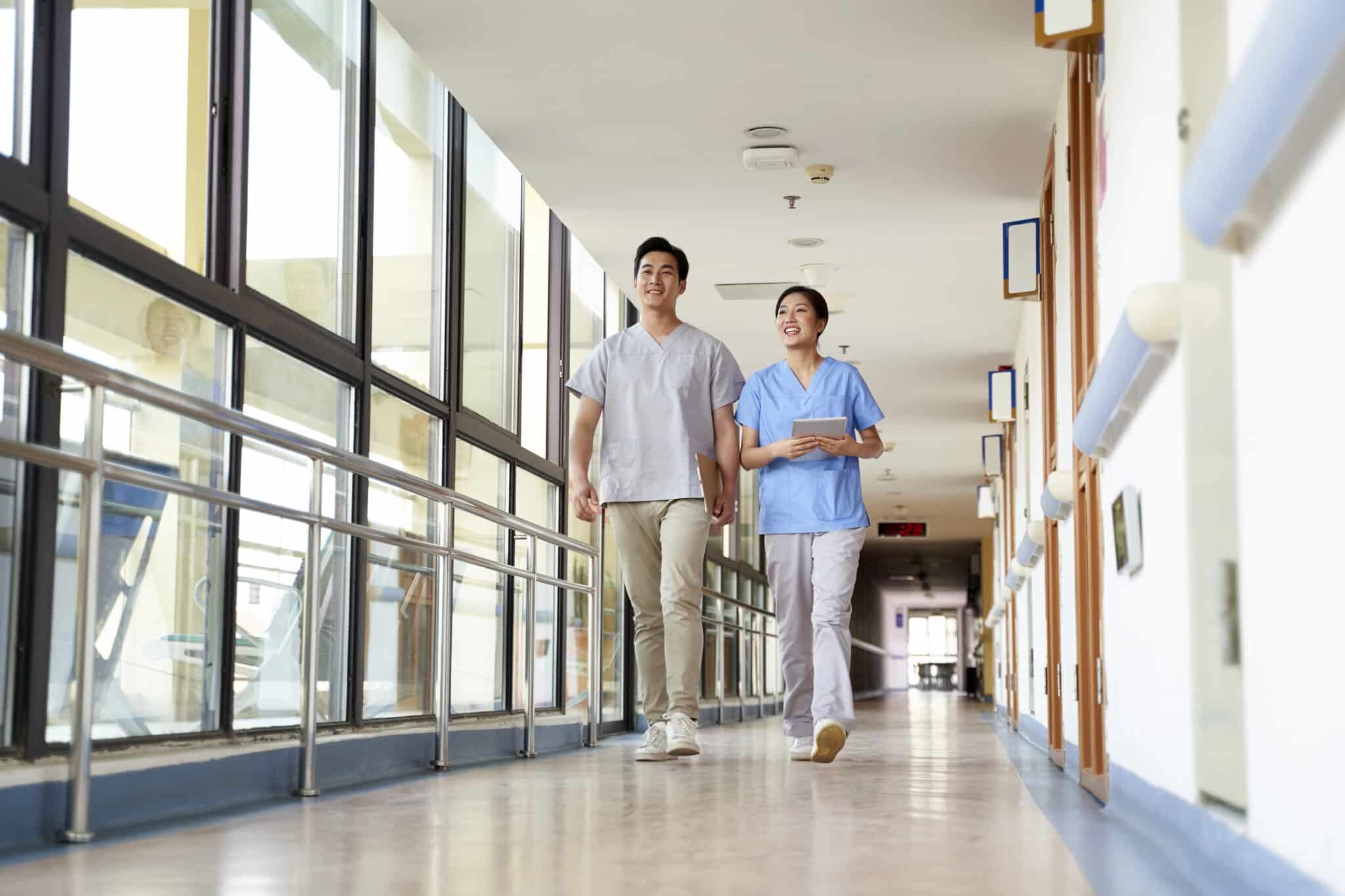 therapists walking talking hallway