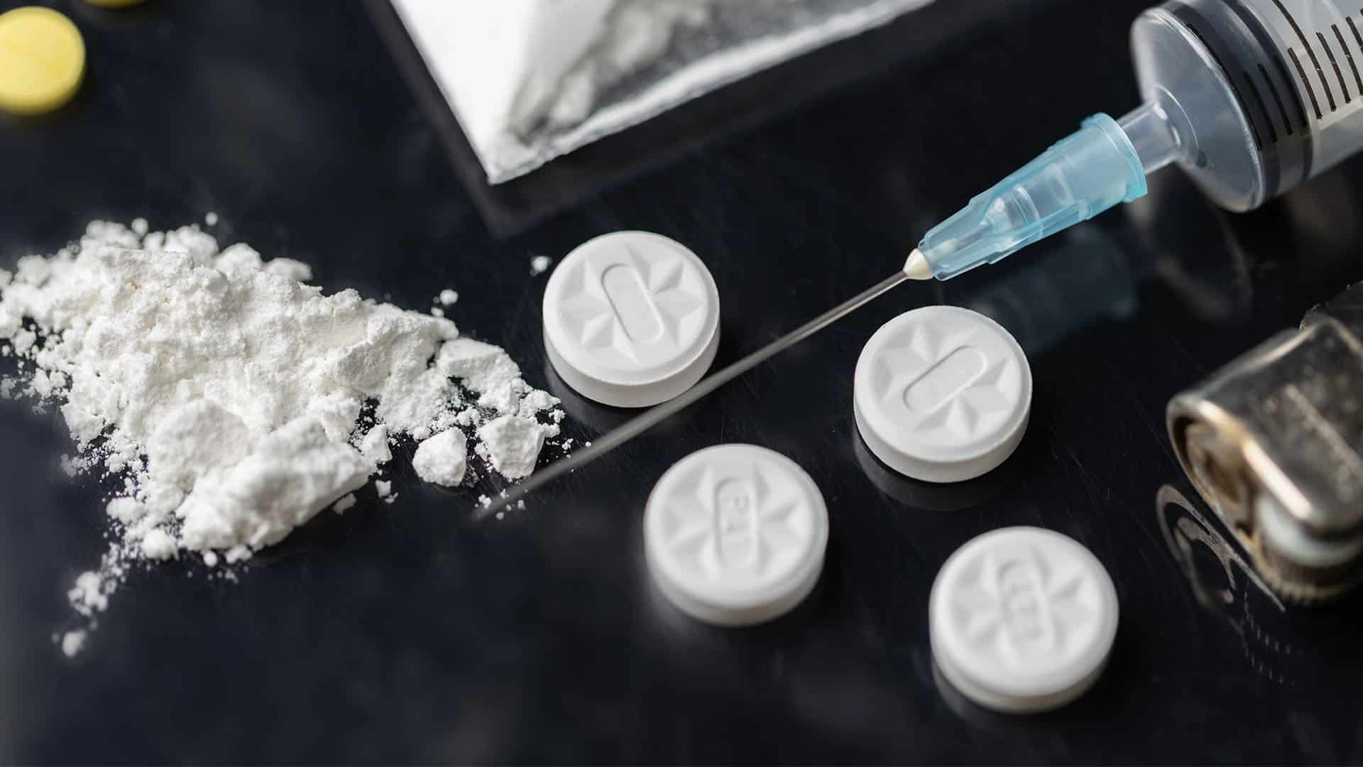 Assorted drugs and pills displayed on a table